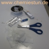 Bild: Feuer machen mit einer Batterie und Kaugummipapier